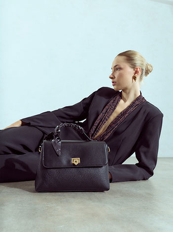 Faux leather bag with decorative scarf in black