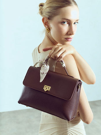 Faux leather bag with decorative scarf in wine red