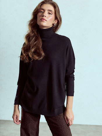 Asymmetric turtleneck with side slits in black