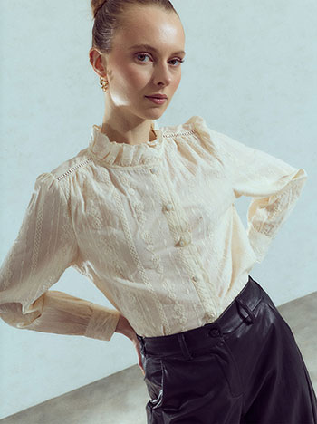 Shirt with embroidered details in beige