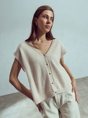 Knit vest with rhinestones in beige