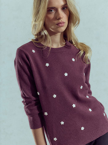 Sweater with flowers in dark purple