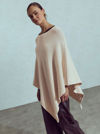 Knit asymmetric cape in beige