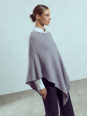 Knit asymmetric cape in grey