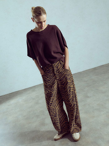Corduroy zebra print trousers in dark beige