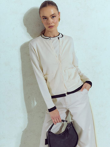 Sleeveless sweater and cardigan set in light beige