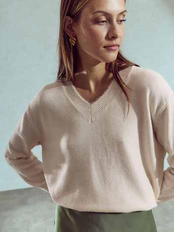 Sweater with fluffy details in beige