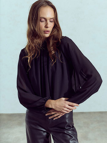 Top with semi sheer sleeves in black