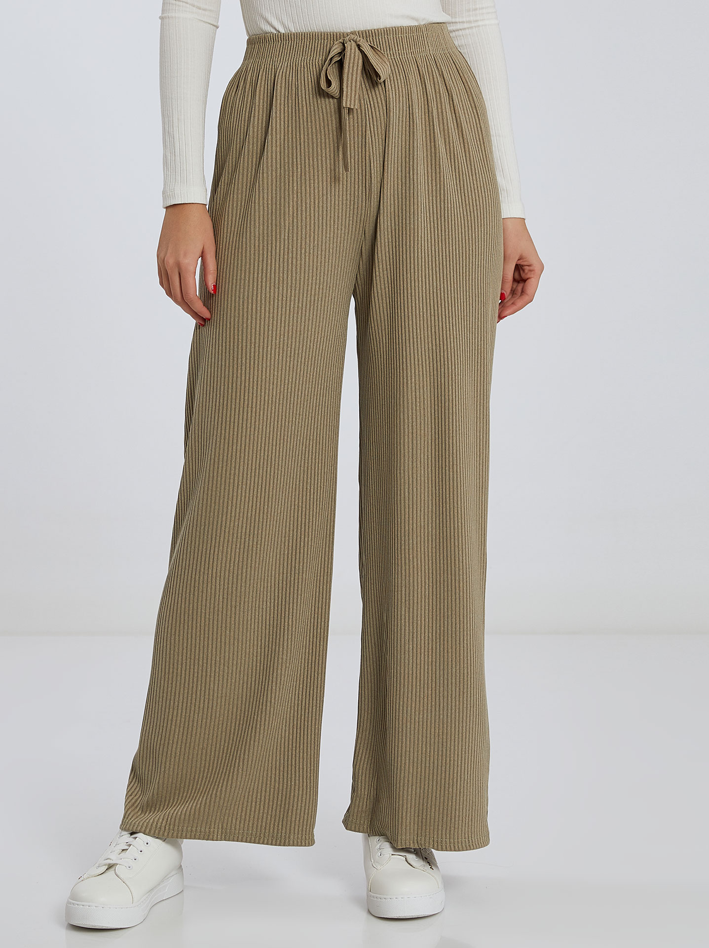 Ribbed wide leg trousers in light olive green | Celestino