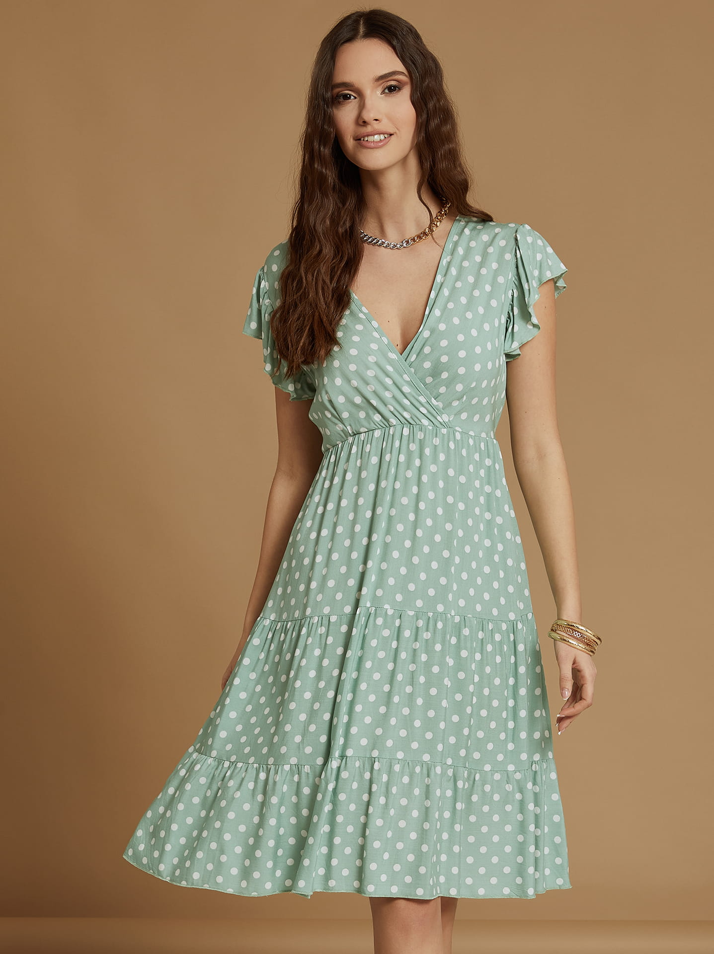 Polka dot dress with ruffles in mint | Celestino