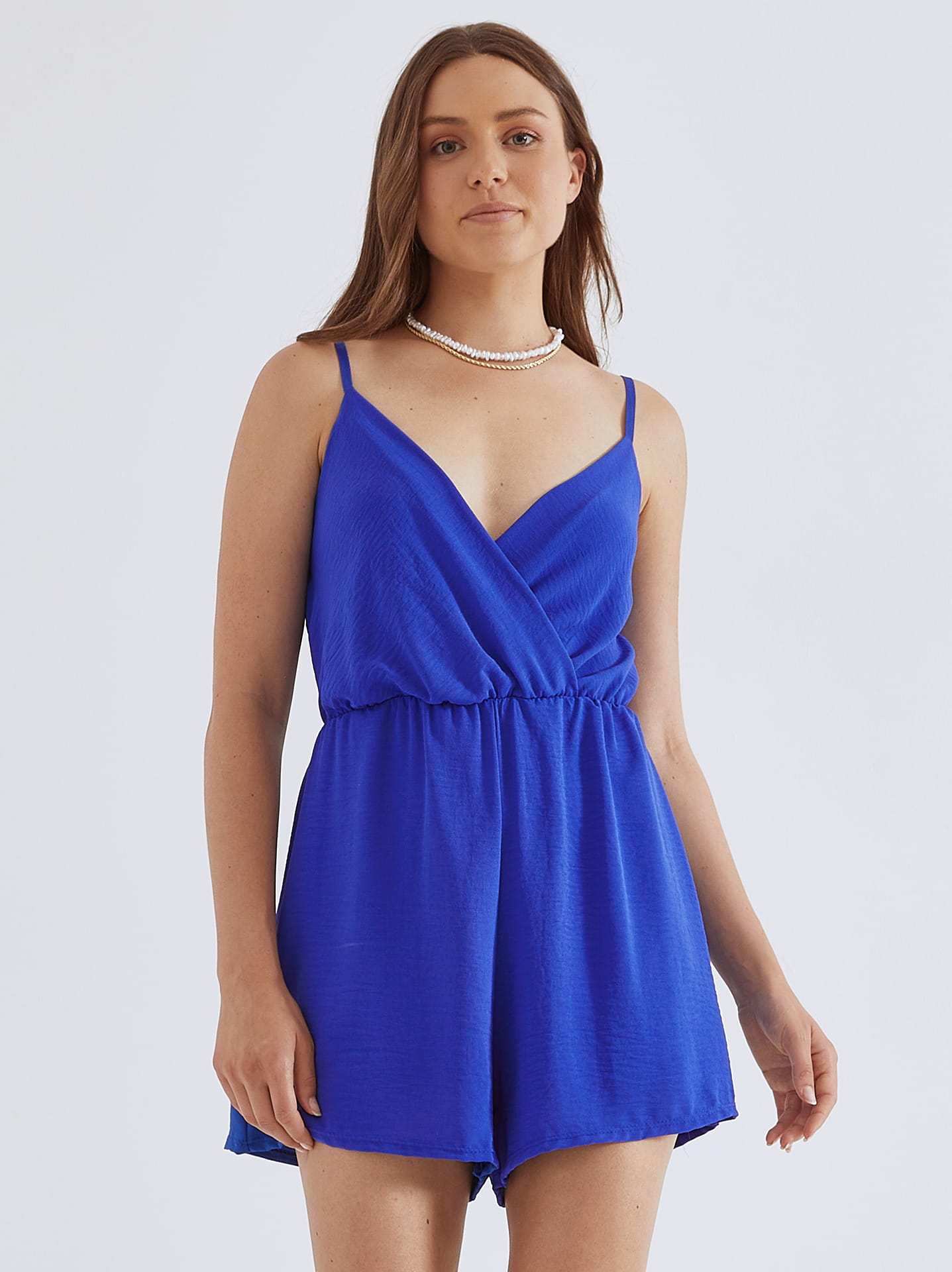 Wrap front playsuit with straps in electric blue Celestino